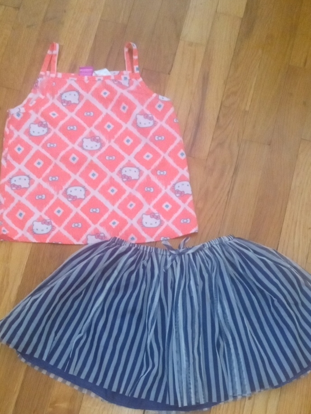 girl 6 hello kitty tank and striped skirt